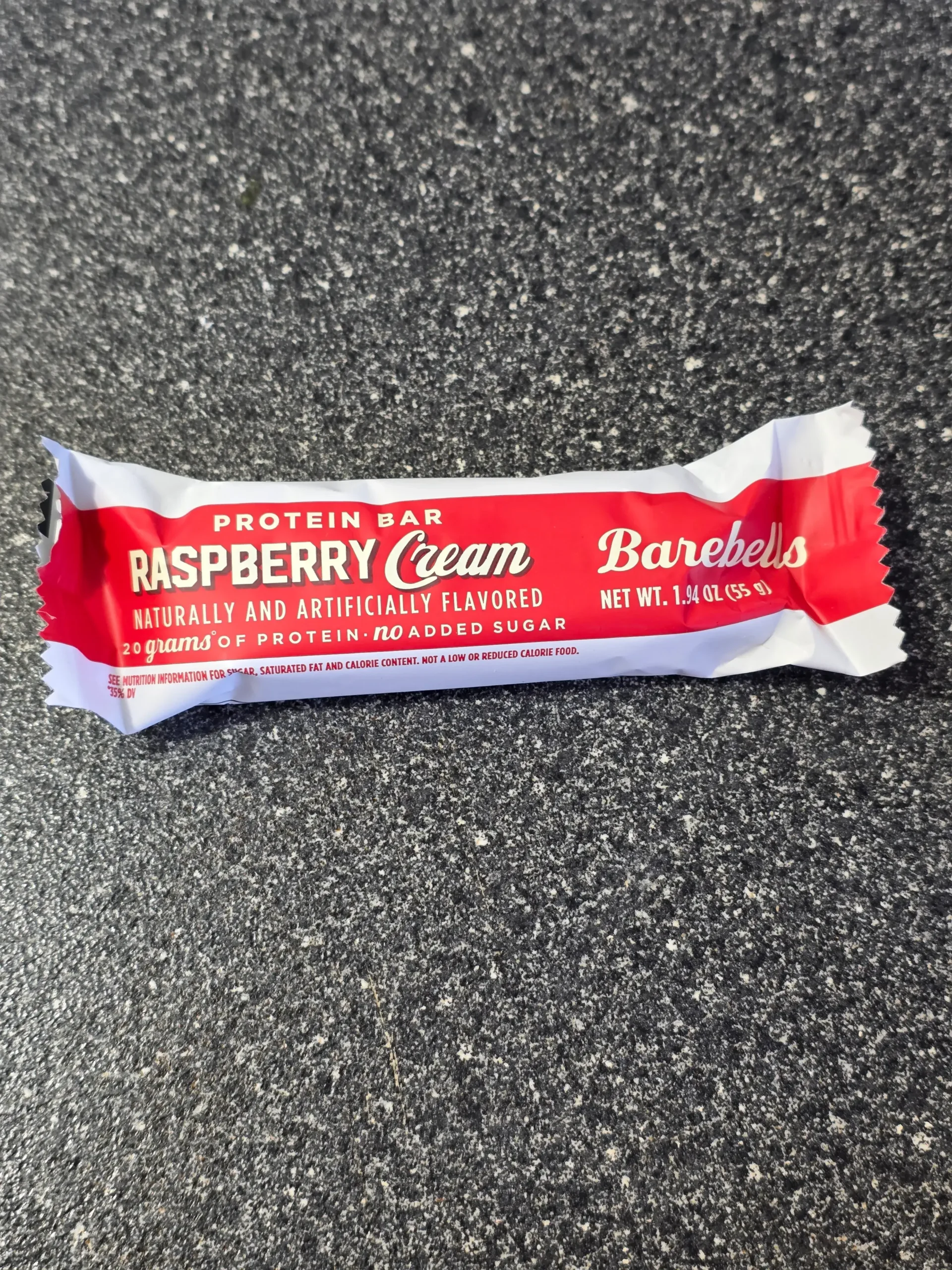 Barebells Raspberry Cream Protein Bar.