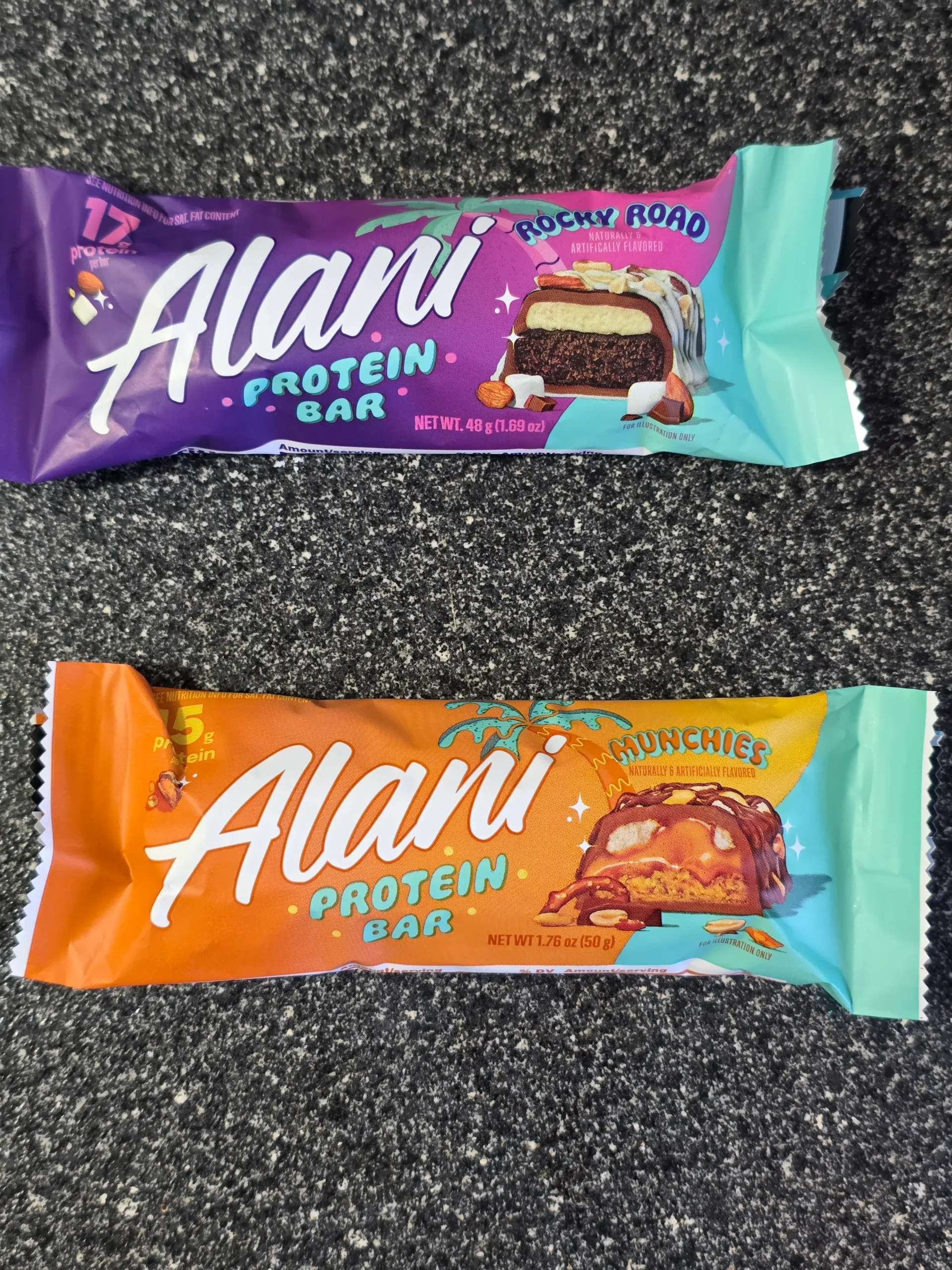 Alani Protein Bar: Caramel Crunch, Rocky Road, Peanut Butter & Jelly, and Munchies.