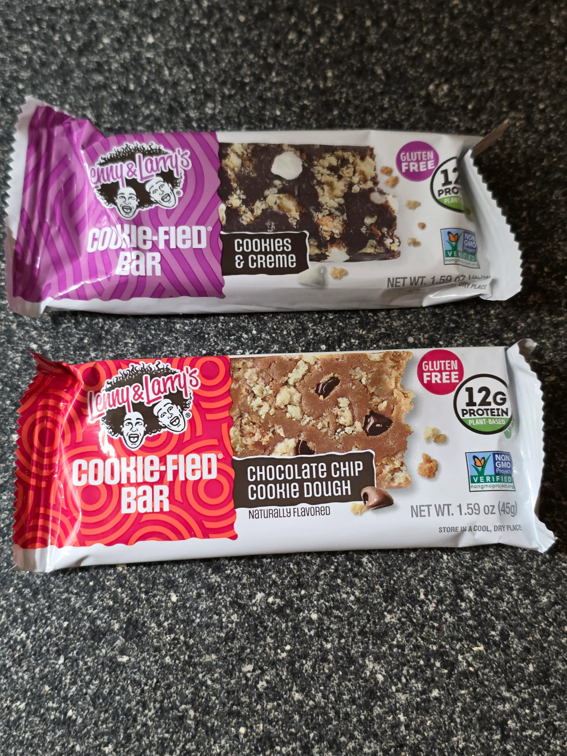 Lenny & Larry's Cookie-fied plant-based Protein Bar Variety Pack: Chocolate Chip Cookie Dough, Cookies & Creme, Peanut Butter Chocolate Chip, and White Chip Macadamia.
