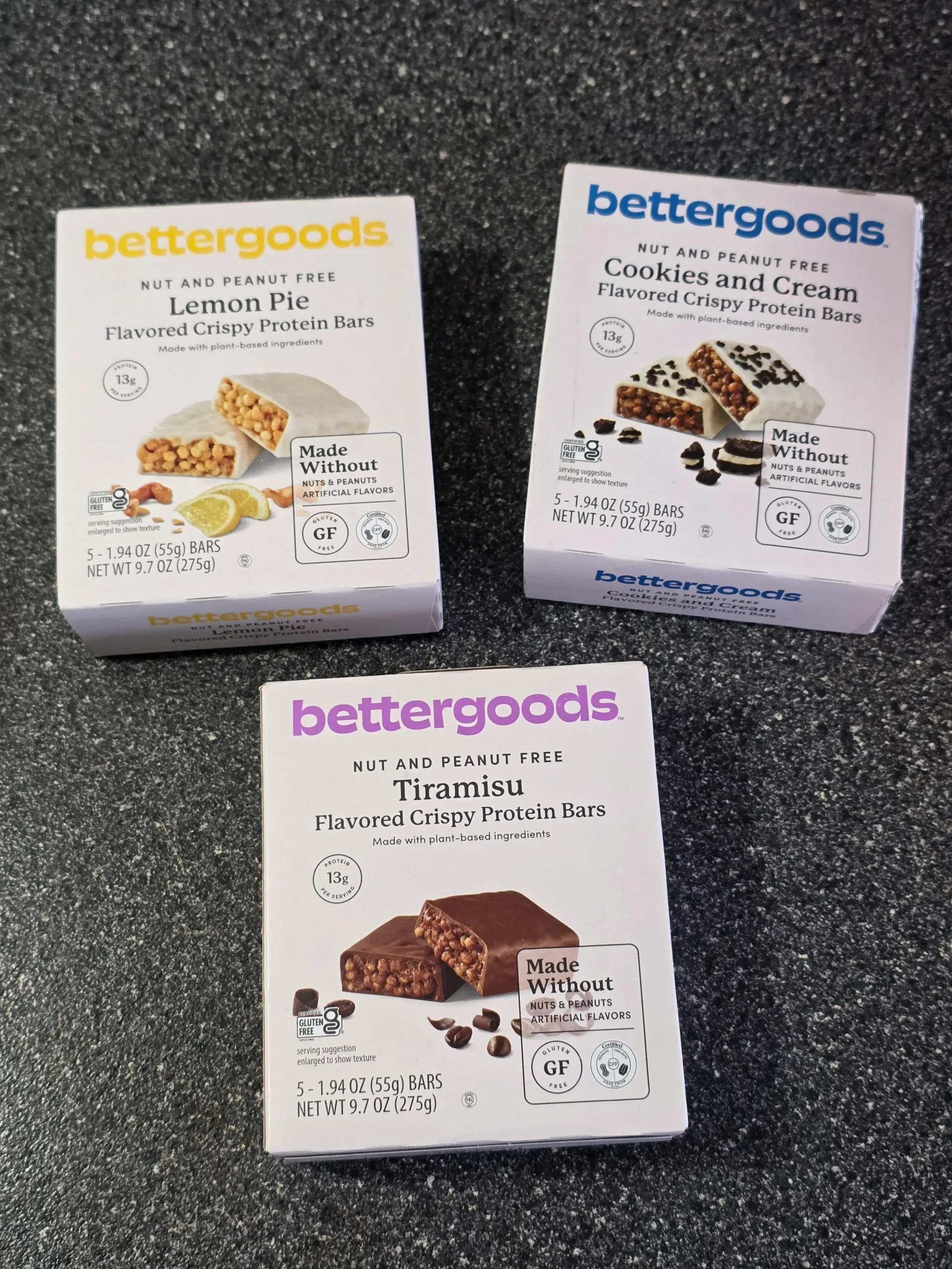 Walmart bettergoods Flavored Crispy Protein Bars: Lemon Pie, Tiramisu, and Cookies and Cream.