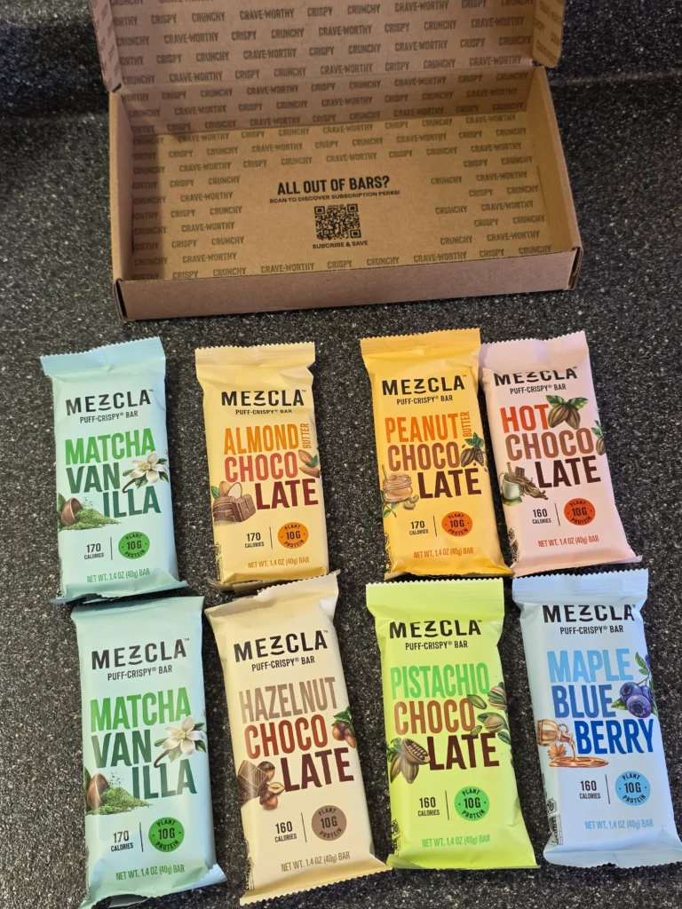 Mezcla Puff-Crispy Plant-Based Protein Bars Variety Pack: Peanut Butter Chocolate, Hot Chocolate, Pistachio Chocolate, Maple Blueberry, Hazelnut Chocolate, Almond Butter Chocolate, and Matcha Vanilla.