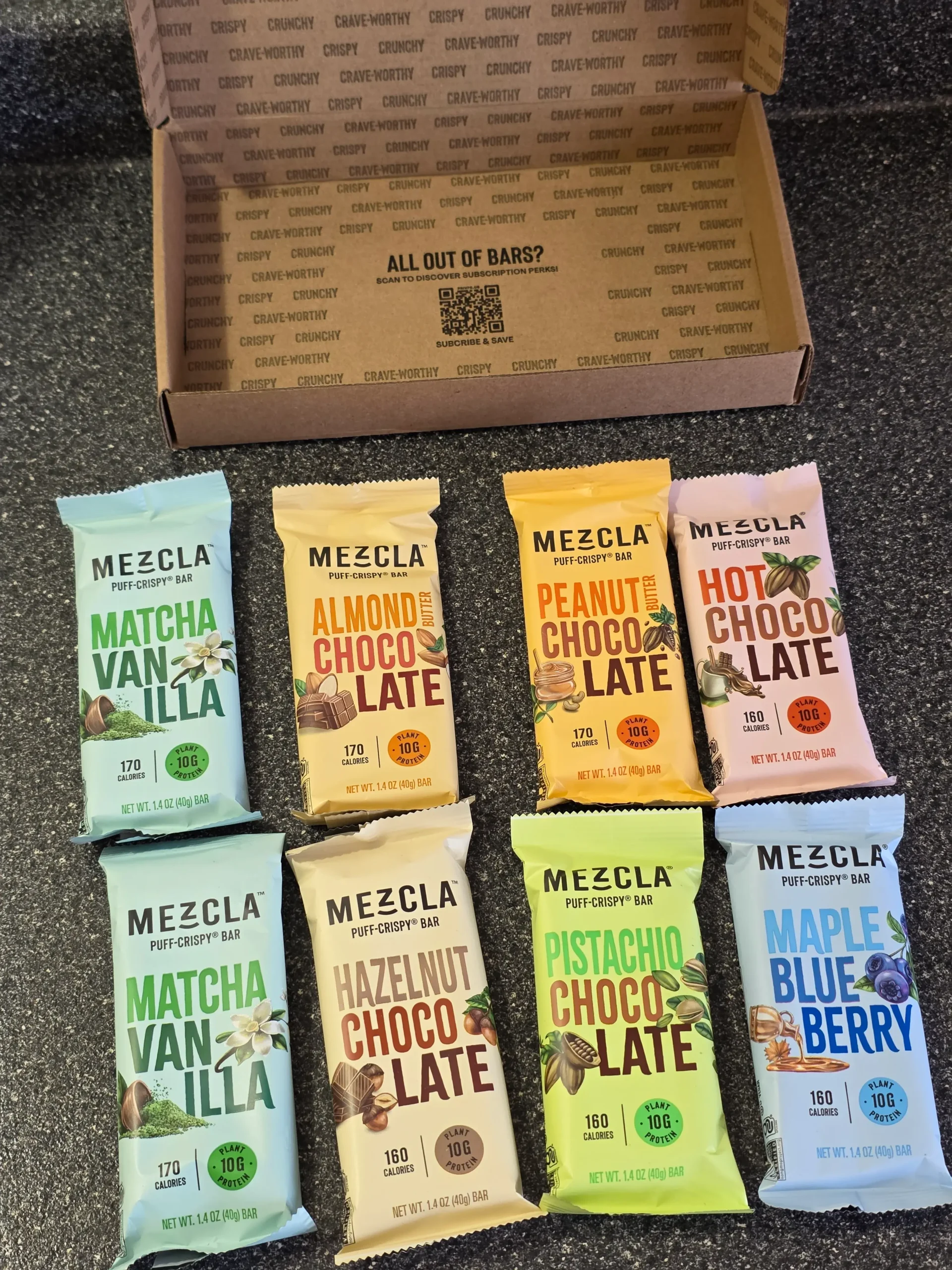 Mezcla Puff-Crispy Plant-Based Protein Bars Variety Pack: Peanut Butter Chocolate, Hot Chocolate, Pistachio Chocolate, Maple Blueberry, Hazelnut Chocolate, Almond Butter Chocolate, and Matcha Vanilla.