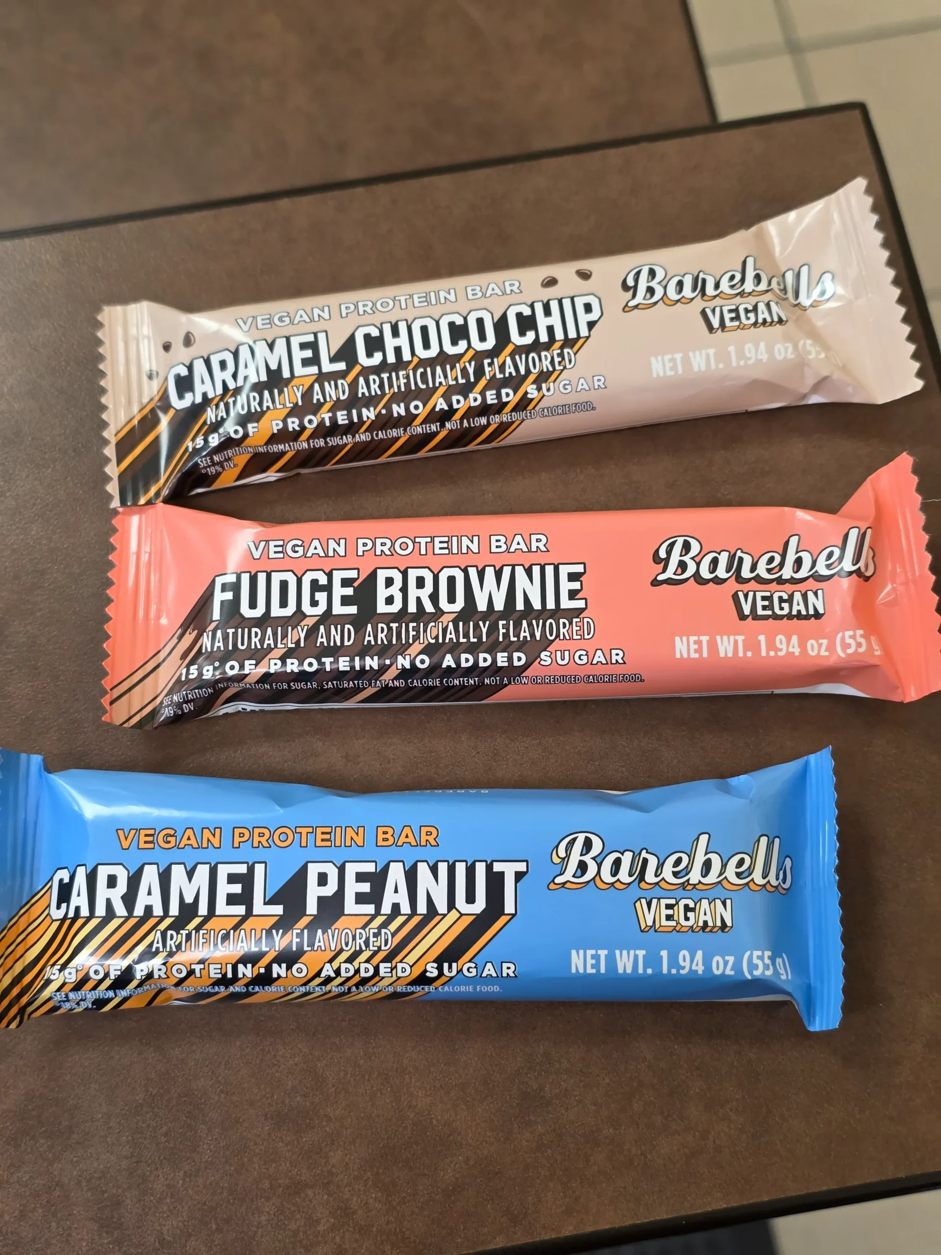 Barebells Vegan Protein Bar: Caramel Peanut, Fudge Brownie, and Caramel Choco Chip.