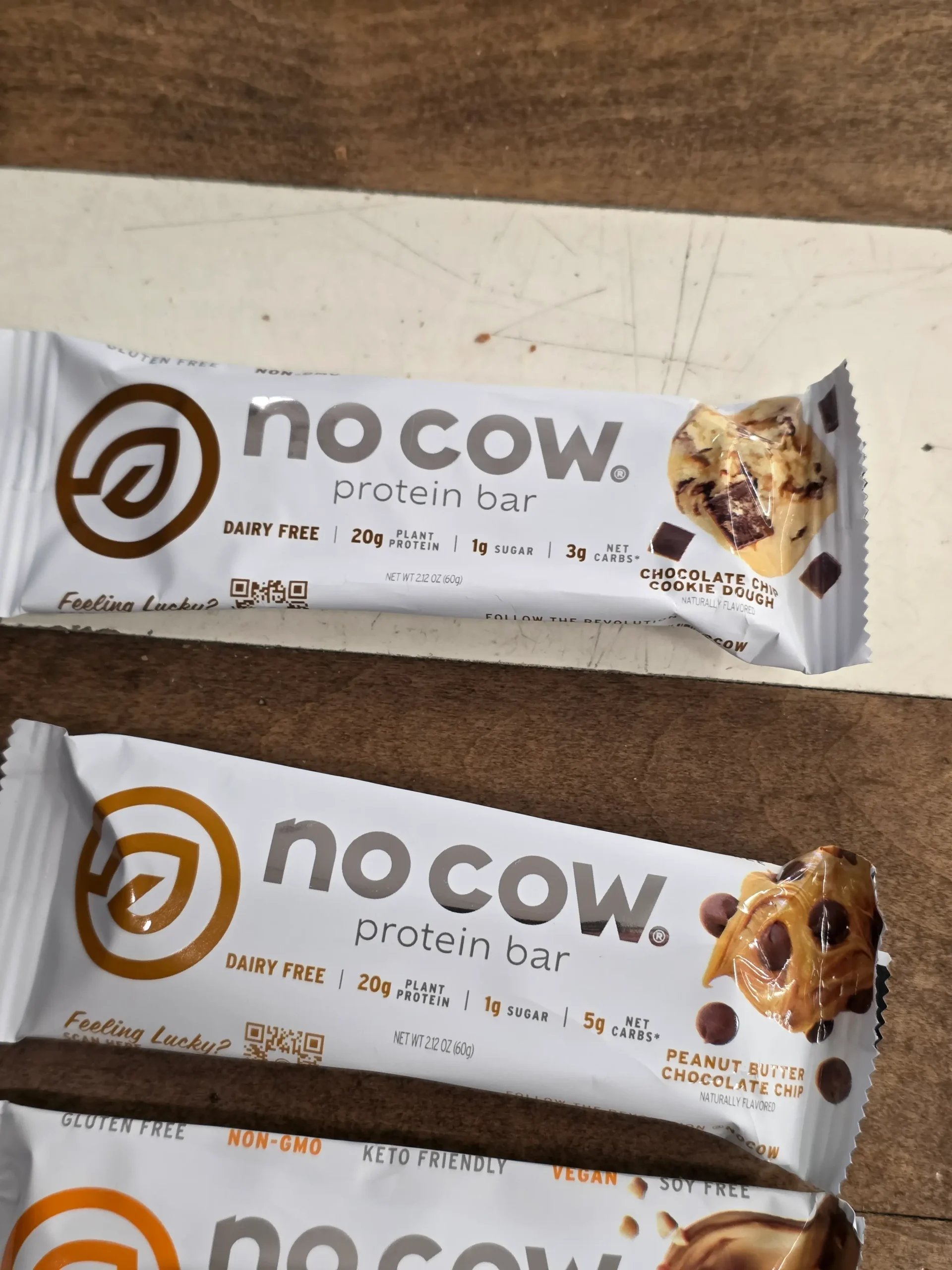 No Cow Protein Bars, Peanut Butter Chocolate Chip, Chunky Peanut Butter, Chocolate Fudge Brownie, and Chocolate Chip Cookie Dough.