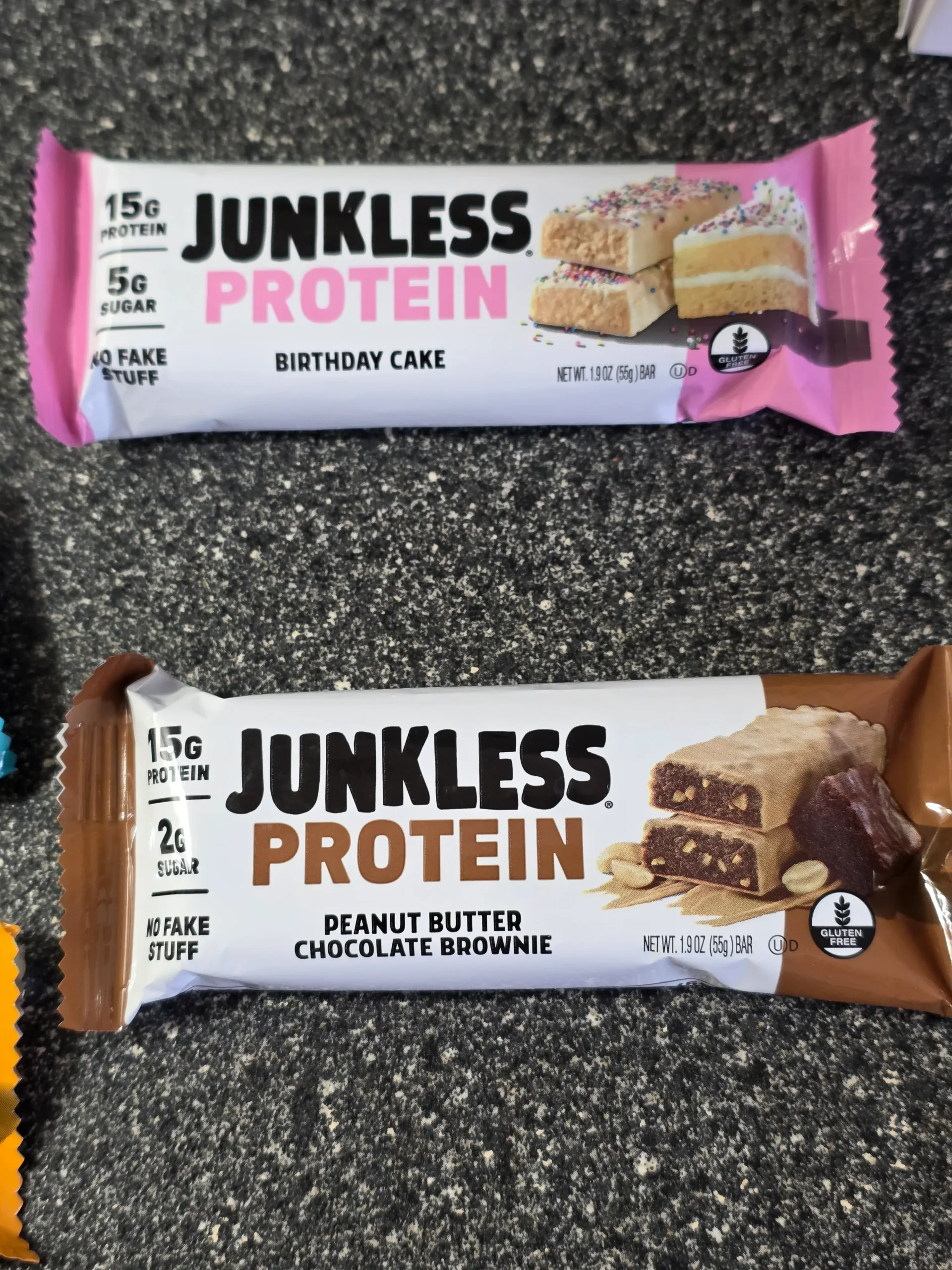 Junkless protein bars, Chocolate Peanut Butter, Birthday Cake, Chocolate Chip Cookie Dough, and Peanut Butter Chocolate Brownie.