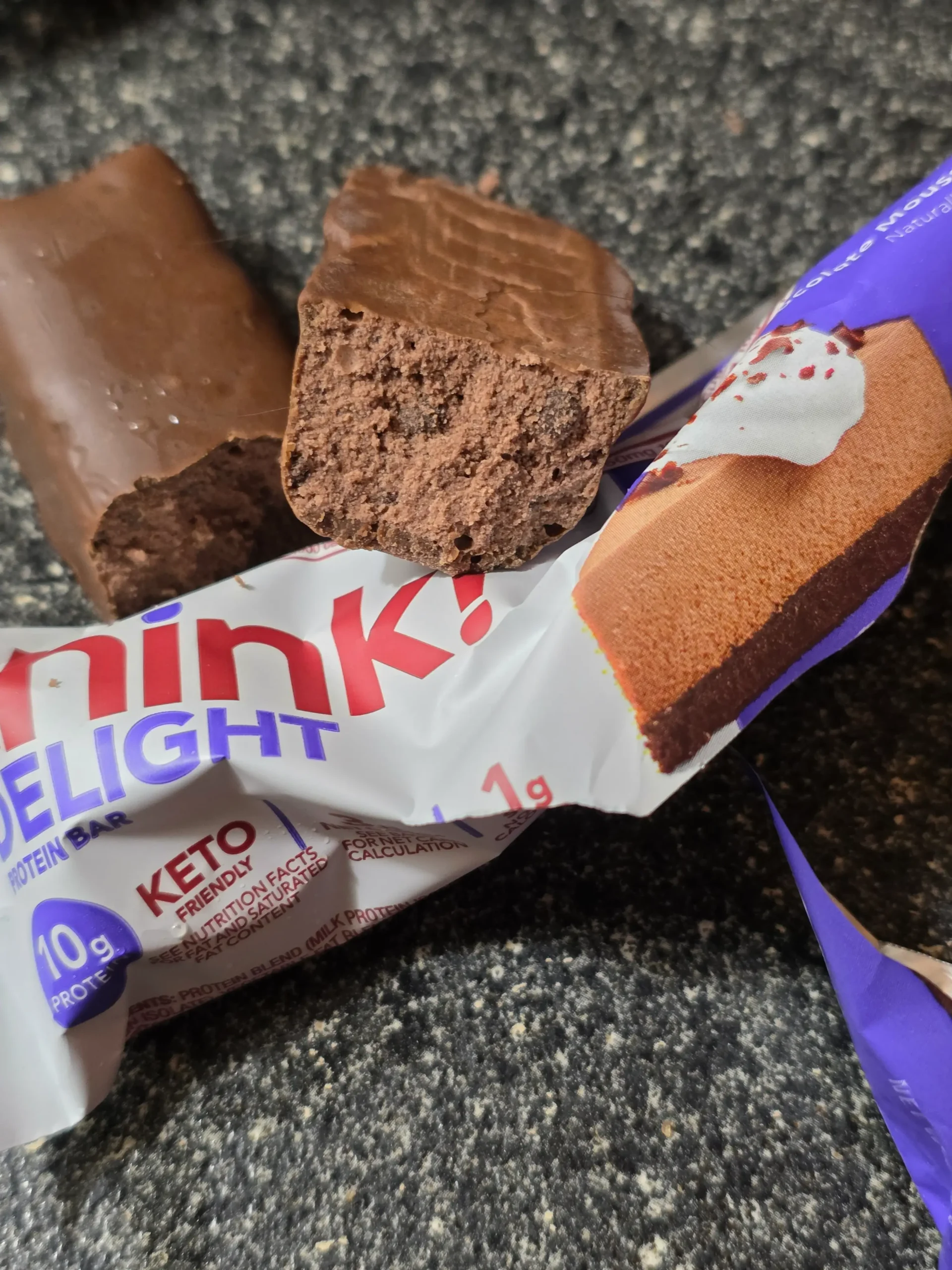 think! Delight protein bars, Chocolate Peanut Butter Cookie Dough, Chocolate Peanut Butter Pie, and Chocolate Mousse Pie.