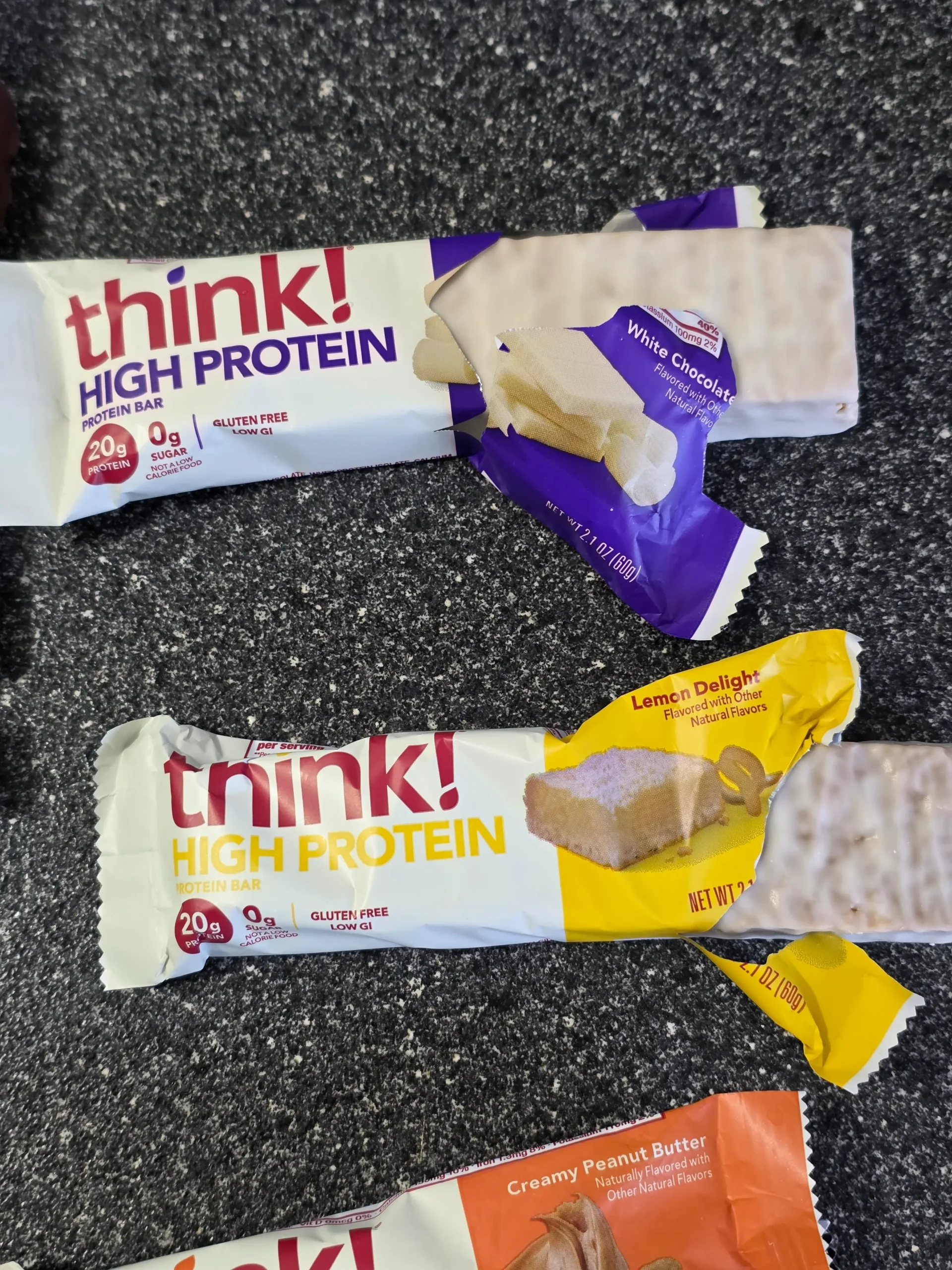 think! Think Protein Bars Girl Scouts Thin Mints, Chunky Peanut Butter, Lemon Delight, Cookies & Creme, White Chocolate, and Creamy Peanut Butter.