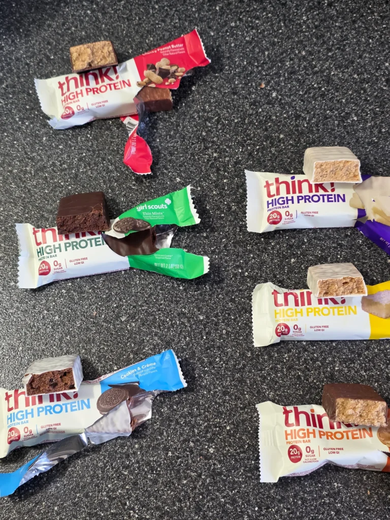 think! Think Protein Bars Girl Scouts Thin Mints, Chunky Peanut Butter, Lemon Delight, Cookies & Creme, White Chocolate, and Creamy Peanut Butter.