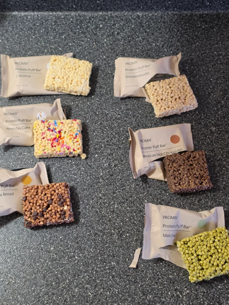 Promix Protein Puff Bar, Coconut, Birthday Cake, Banana Bread, Snickerdoodle, Mexican Hot Chocolate, and Matcha.