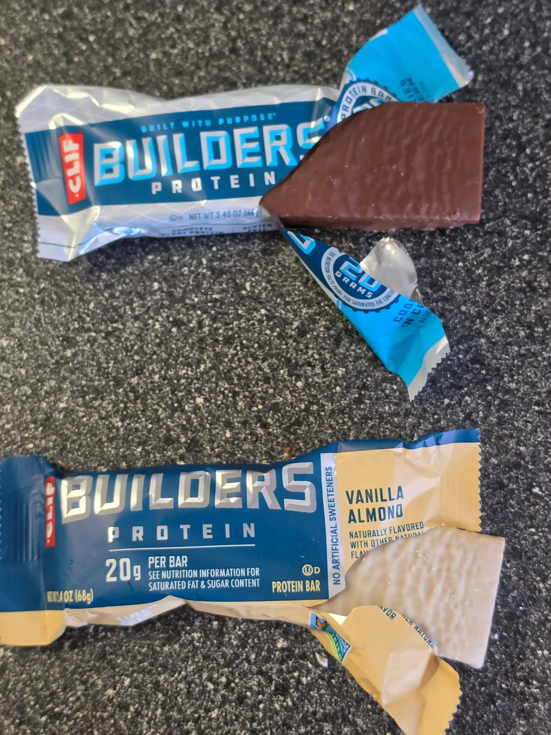 CLIF Builders Protein Bar Cookies 'N Cream and Vanilla Almond.