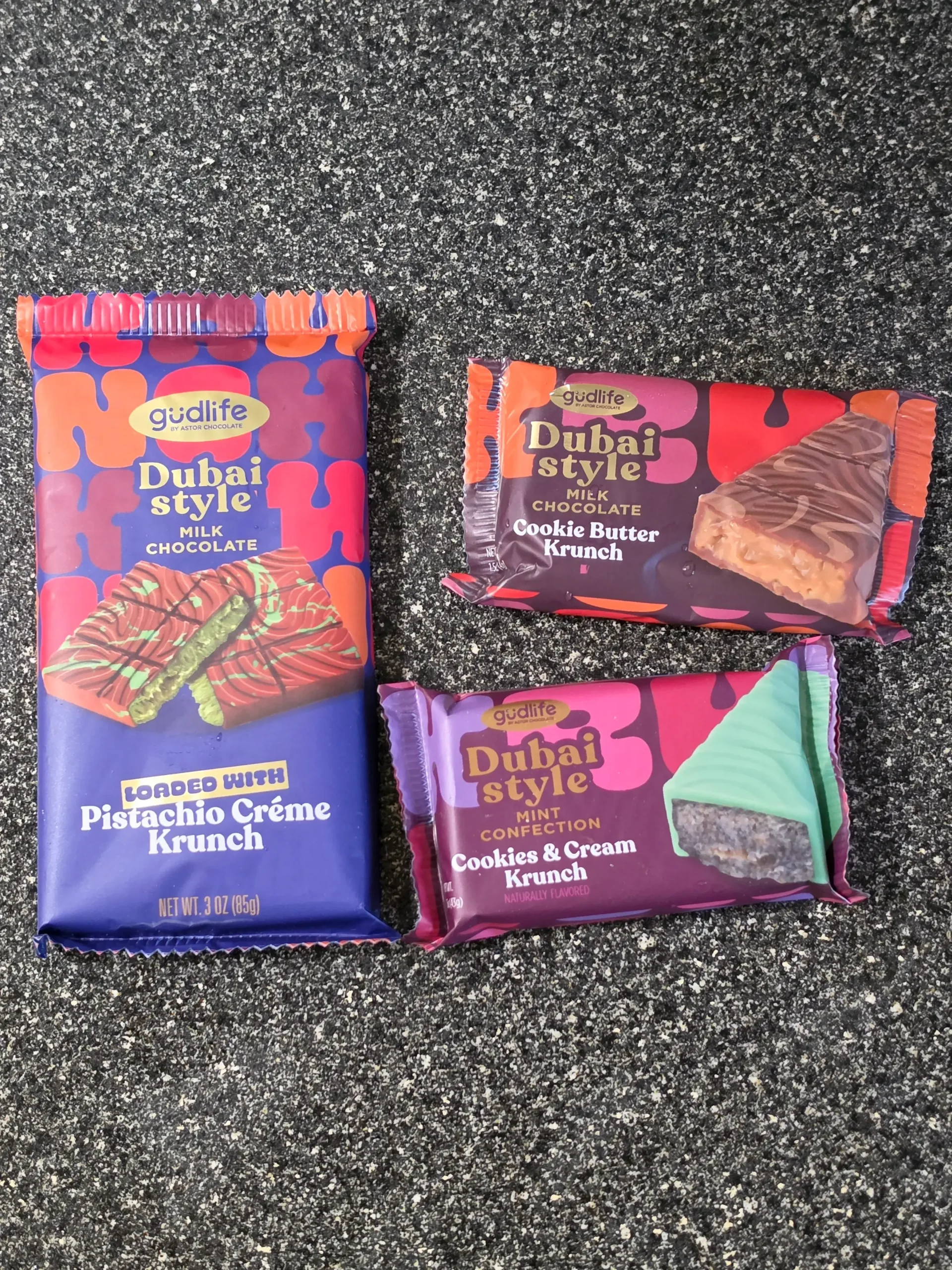 Astor Gudlife Dubai Style Krunch Candy Bars: Pistachio Creme, Cookie Butter, and Cookies & Cream.