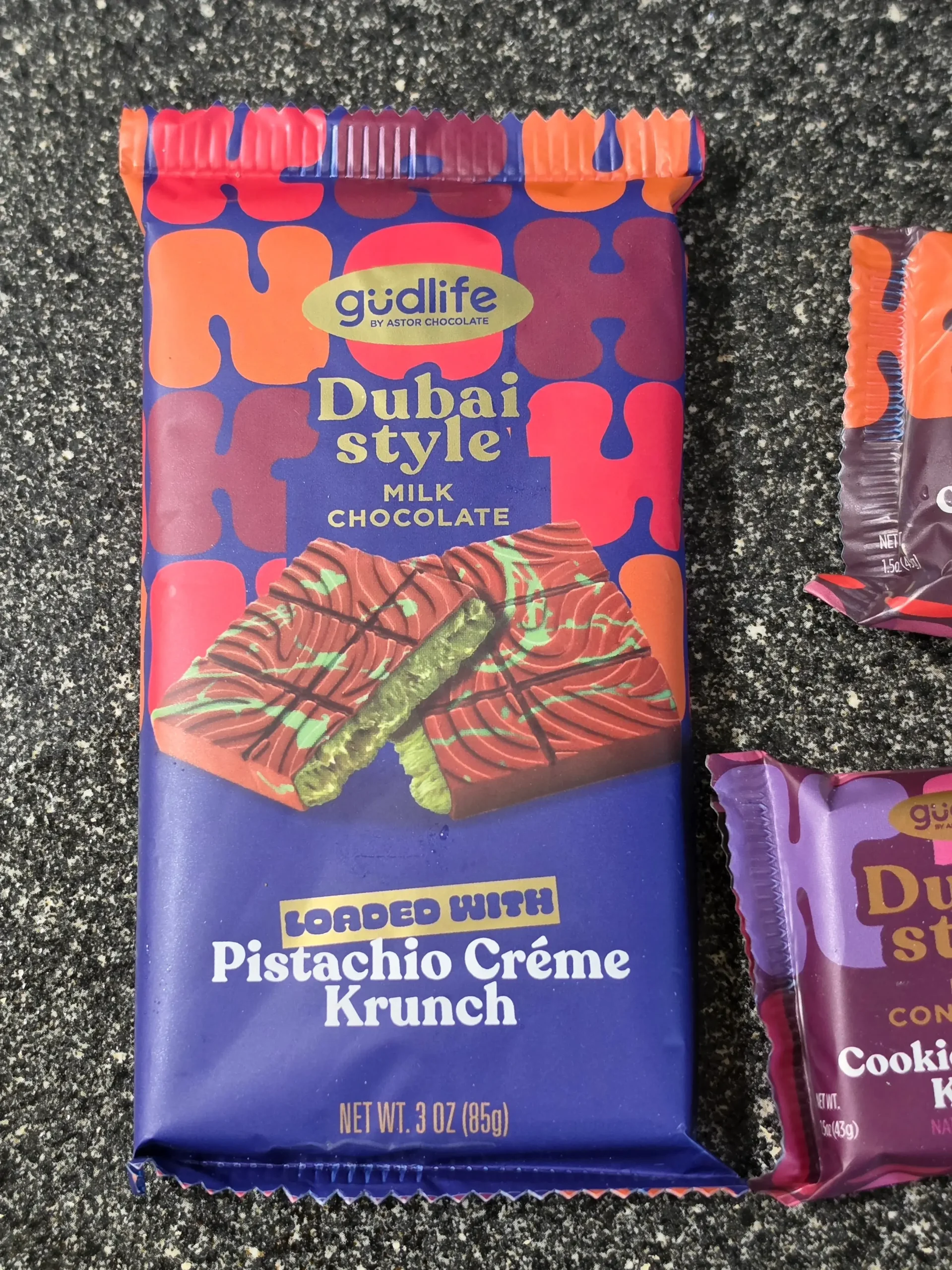 Astor Gudlife Dubai Style Krunch Candy Bars: Pistachio Creme, Cookie Butter, and Cookies & Cream.