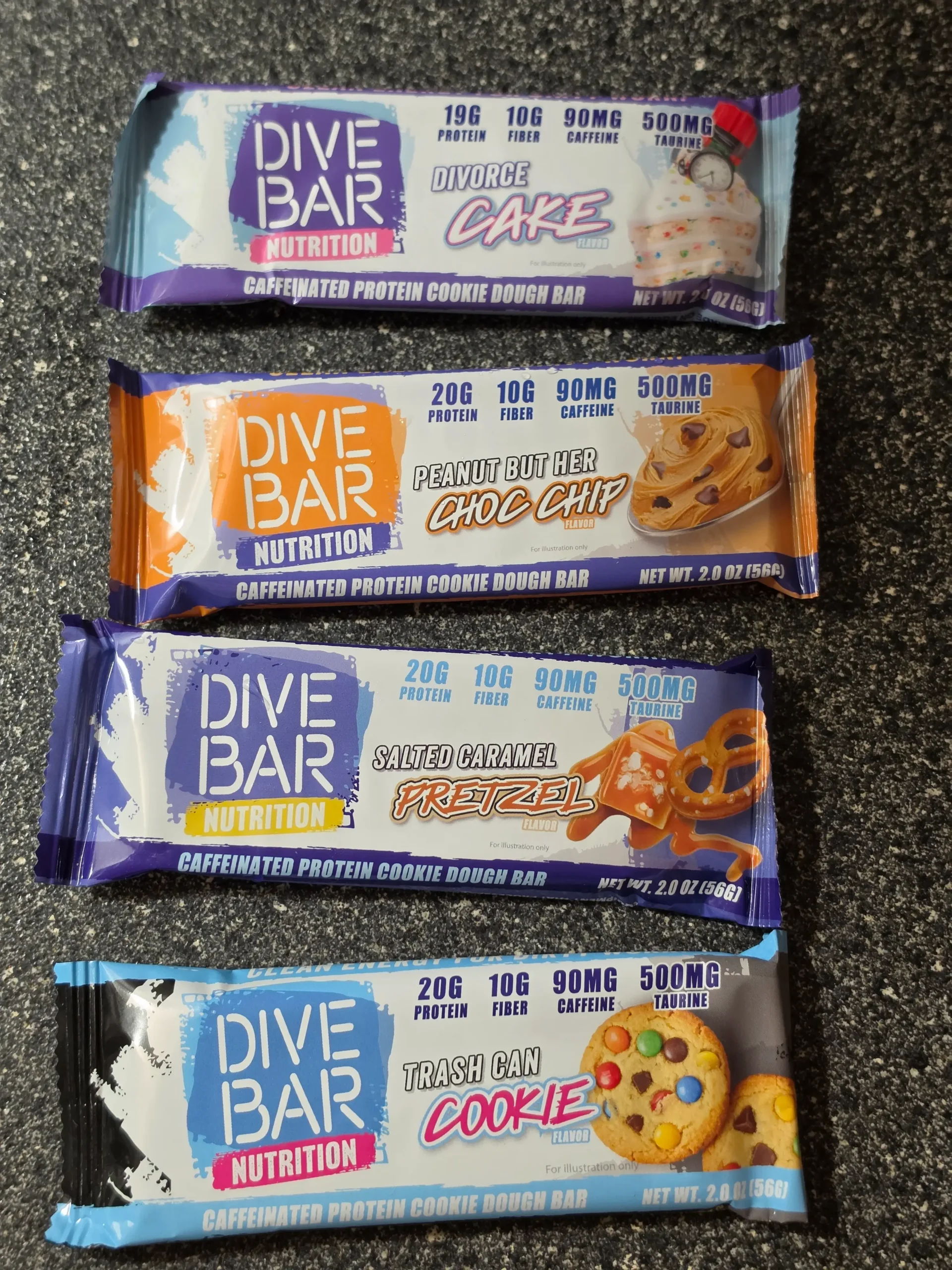 Dive Bar four-bar variety pack. Flavors: Trash Can Cookie, Salted Caramel Pretzel, Peanut But Her Chocolate Chip, and Divorce Cake.