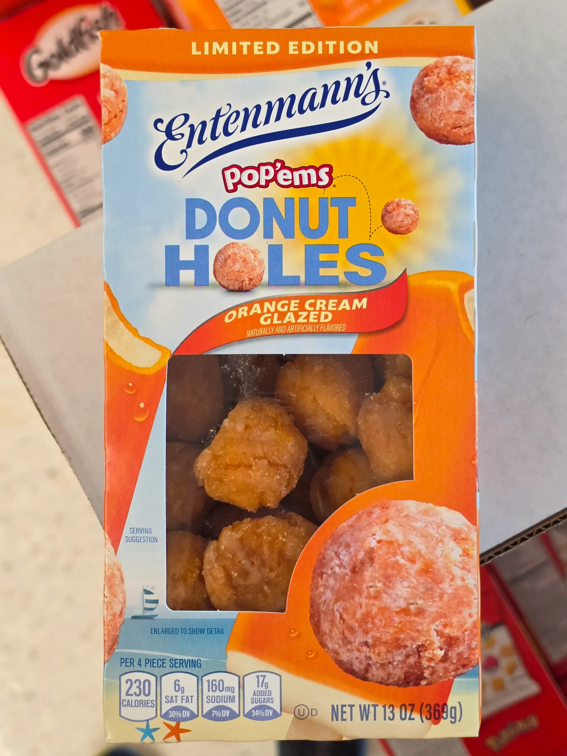 Entenmann's Pop'ems Orange Cream Glazed Donut Holes.