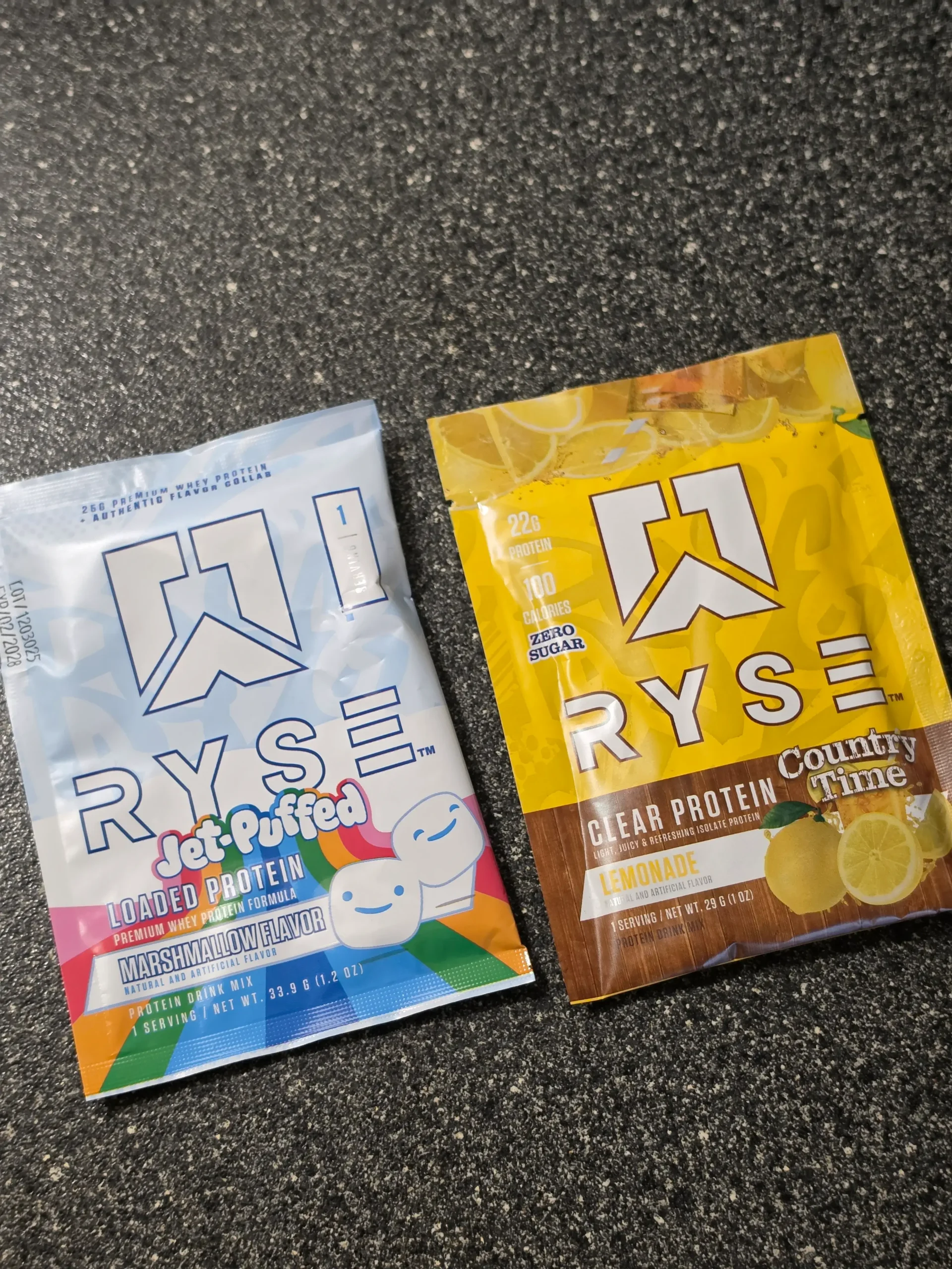 Ryse protein variety pack: Kool-Aid Tropical Punch, Country Time Lemonade, Cinnamon Toast, Little Debbie Cosmic Brownie, Jet-Puffed Marshmallow, Little Debbie Strawberry Shortcake Rolls.
